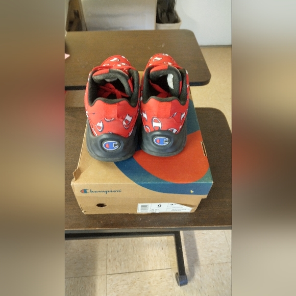 Almost new pair of champion Red sneakers c pattern going on through the sneaker - Picture 3 of 3